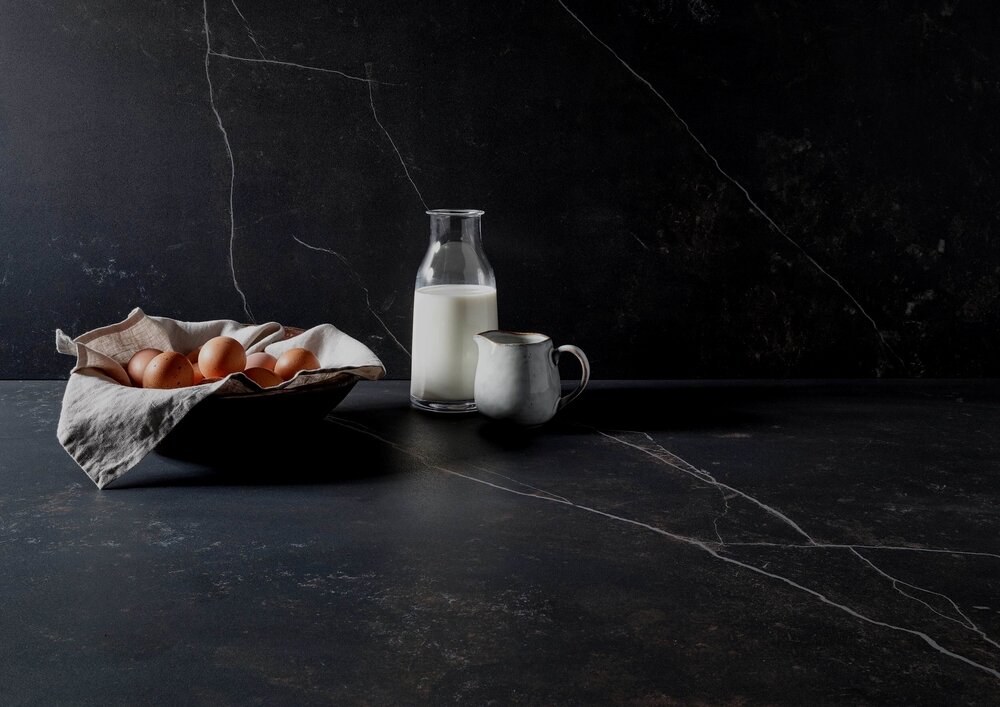 black countertop with milk